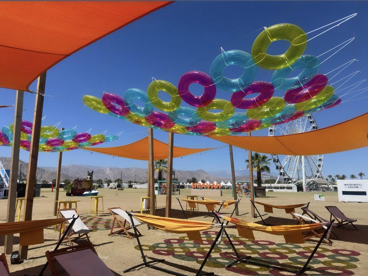 Havasu lounge with a canopy of suspended inner tubes, shade sails and hammocks