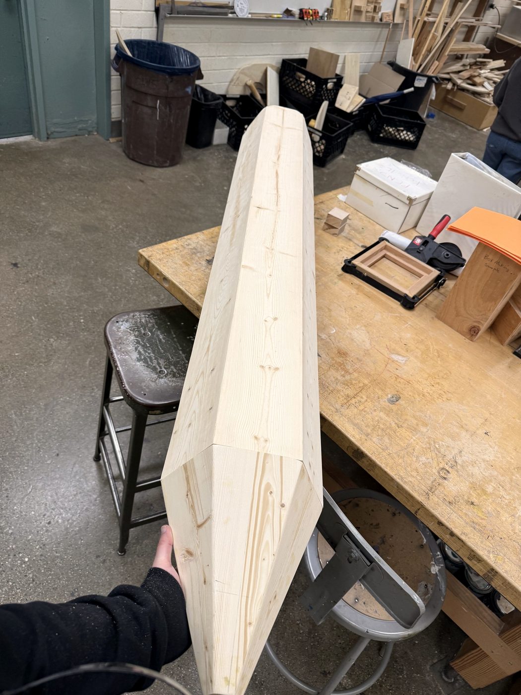 Holding the long hexagonal body upright